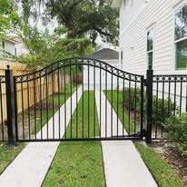 Single leaf aluminum driveway gate with royal arch and ring designs
