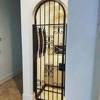 Wrought iron wine cellar gate