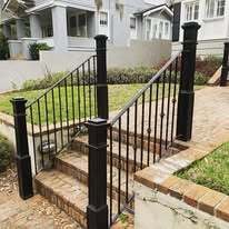 Wrought iron railings with cast iron newel posts