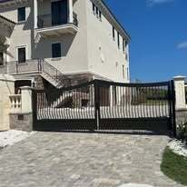 Kynar coated aluminum gates with arch top, kickplate and belly pickets