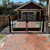 Wrought iron double leaf gates with arch top, kickplate and locinox lock
