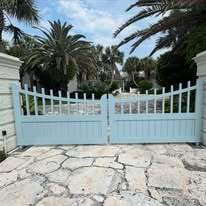 Kynar coated aluminum drive gates to mimic wood