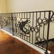 Whimsical wrought iron railing