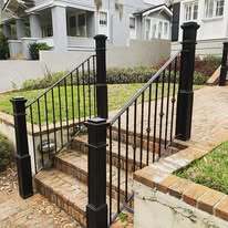 Wrought iron railings with cast iron newel posts