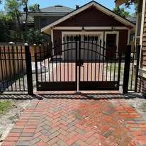 Wrought iron double leaf gates with arch top, kickplate and locinox lock