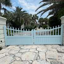 Kynar coated aluminum drive gates to mimic wood