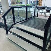 Aluminum framed glass railing for Tommy Bahama