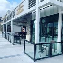 Aluminum framed glass railing for Tommy Bahama